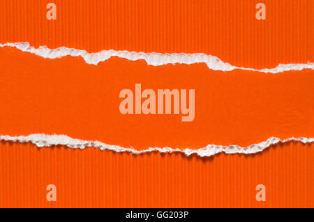 orange torn corrugated paper background texture Stock Photo