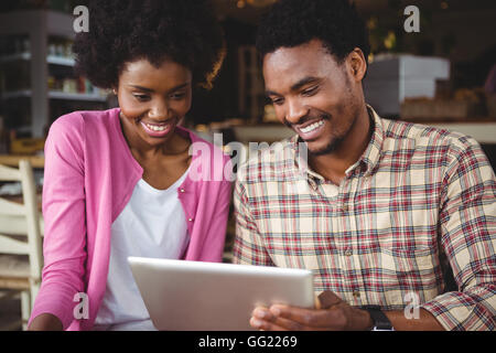 Young couple using digital tablet Stock Photo