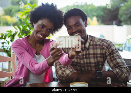 Young couple taking selfie Stock Photo