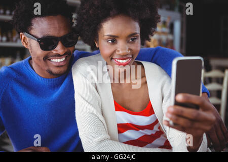 Smiling couple taking a selfie Stock Photo