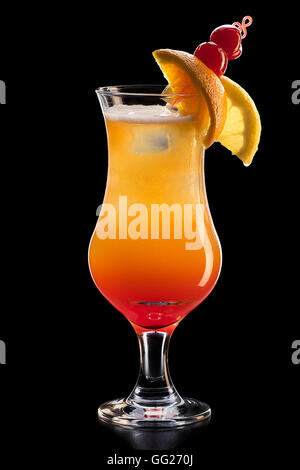 Fresh orange cocktail in a glass decorated with cherry and two slices orange Stock Photo