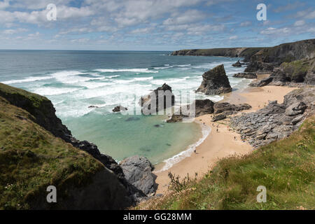A view of Bedruthan Steps beach with rocky outcrops on the north Cornwall Coast UK Stock Photo