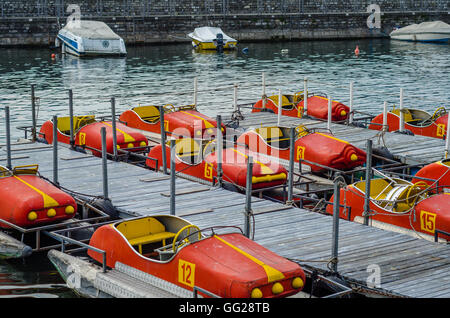 Berthing river cars, the quay of Como lake, Italy Stock Photo