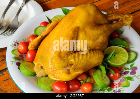 Yellow turkey roast with turmeric, traditional vegetable and the natural vegetables clinging to it Stock Photo