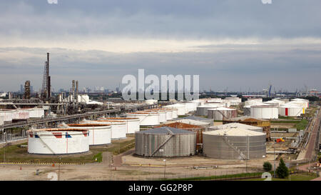 Oil refinery in the Port of Rotterdam. Highrise of the city is visible in the background. Stock Photo