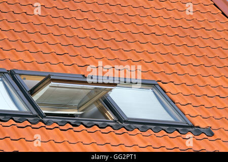 Red tiled roof and windows Stock Photo