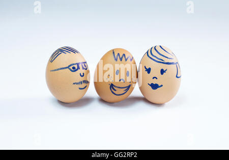 A happy, harmonious three member egg family. Stock Photo