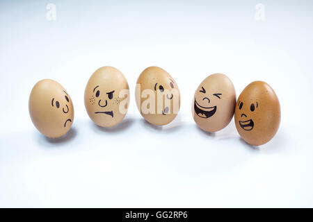 Group of chicken eggs with various emotions Stock Photo