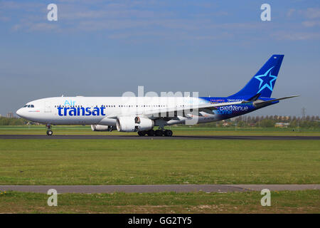 Amsterdam/Netherland April 9, 2016: Airbus A330 from Transat Airline landing at Amsterdam Airport Stock Photo