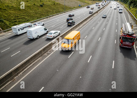 Various vehicles, including fire engine, on the 4-lane section of the M1 motorway, looking South. Stock Photo