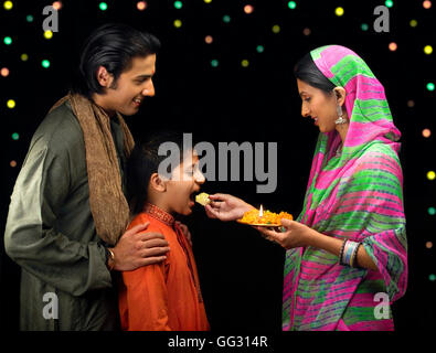 Family celebrating diwali Stock Photo