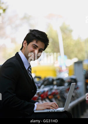 Man working on a laptop Stock Photo