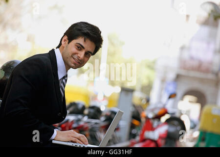 Man working on a laptop Stock Photo