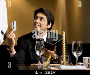 Man paying the bill Stock Photo