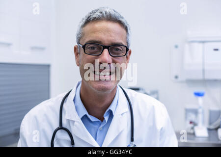 Portrait of dentist in spectacles Stock Photo