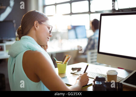 Graphic designer using graphics tablet Stock Photo