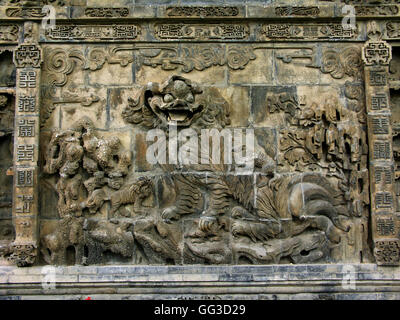 Dragon wall brick relief in the Lion Garden of the Chang Mansion. Stock Photo