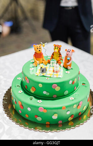 Birthday Cake With Candles And Winnie The Pooh By Disney Stock Photo Alamy