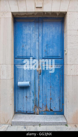 Blue wooden painted door background for copy space. Stock Photo