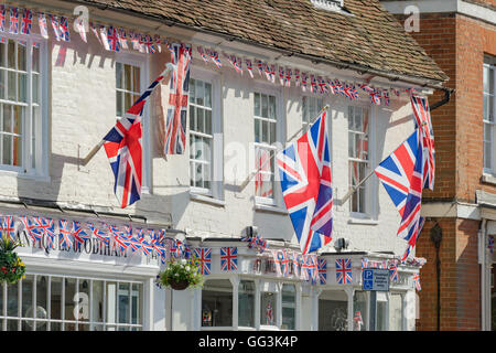Union Jack flags flying in Odiham during Queen Elizabeth's 90th birthday celebration week. Stock Photo