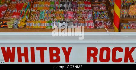 Traditional rock candy sticks on sale on a stall in the seaside town of Whitby, North Yorkshire, UK. Stock Photo