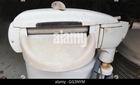 old washing machine with rollers for ringing out water Stock Photo