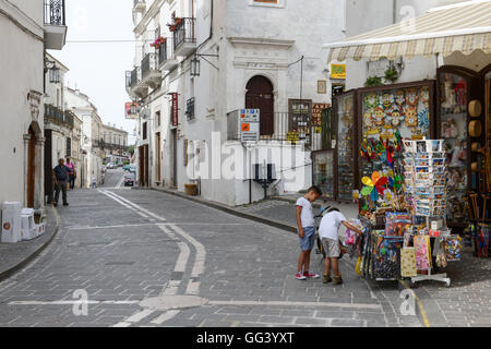 Monte Sant'Angelo, Italy - 28 June 2016: people shopping on the tourist shops of Monte Sant'Angelo on Puglia, Italy. Stock Photo