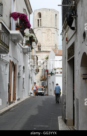 Monte Sant'Angelo, Italy - 28 June 2016: people walking on the streets of Monte Sant'Angelo on Puglia, Italy. Stock Photo