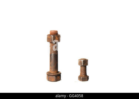 two rusty screws with nuts on white background Stock Photo