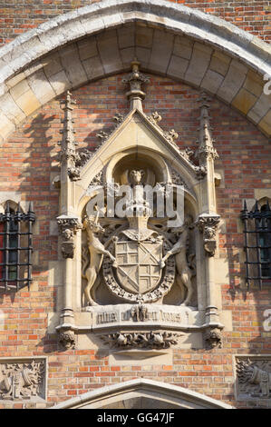 Coat of arms over the front gate to the Gruuthuse Museum Bruges, Belgium.