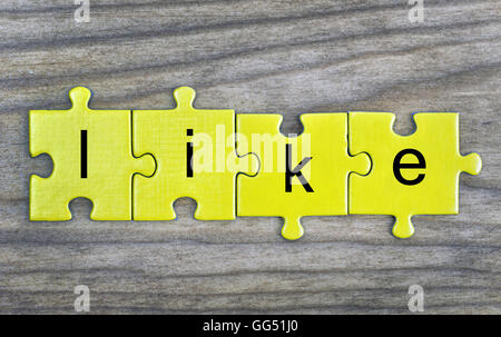 Puzzle pieces with word Like Stock Photo