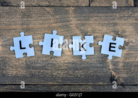 Puzzle pieces with word Like Stock Photo