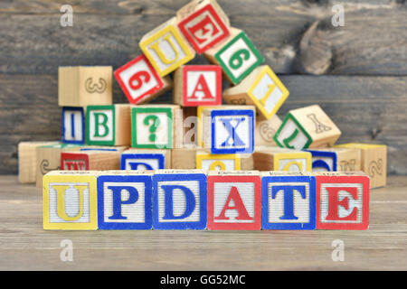 Update word on wooden table Stock Photo
