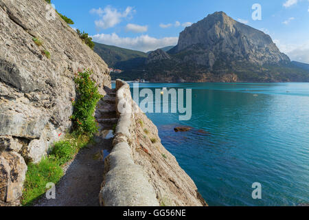 Trail Golitsyn - Falcon Path a mountain pathway carved on the side of Koba-Kaya Stock Photo