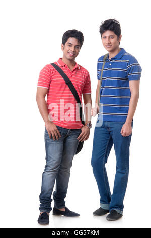 Full length portrait of confident male students against white background Stock Photo