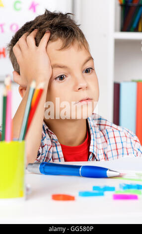 Boy doing homework Stock Photo