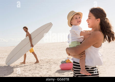Nude image of mother and infant son playing Stock Photo - Alamy