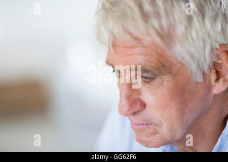 Close-up of a senior man looking serious Stock Photo