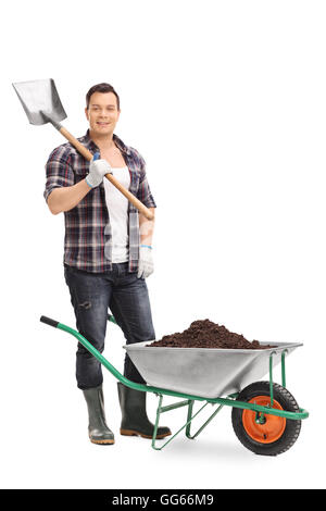 Portrait Of Cheerful Male Gardener With Shovel Presenting Blank Placard ...