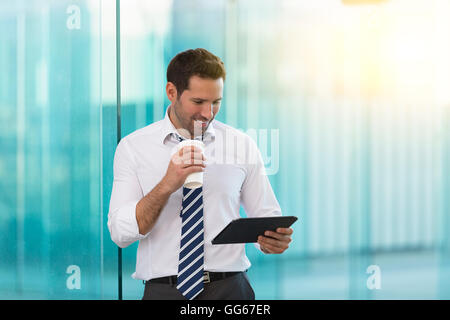 Businessman having a coffee break outside Stock Photo