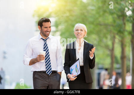 Business people having a coffee break in financial district Stock Photo