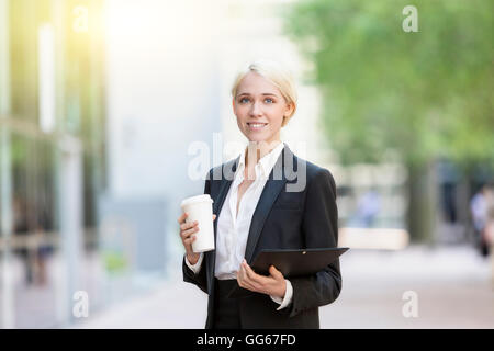 Businesswoman having a coffee break Stock Photo