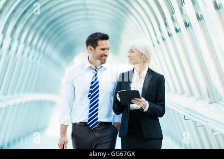Business people meeting in financial district Stock Photo