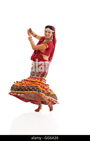 Female dandiya dancer dancing Stock Photo - Alamy