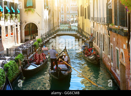 Canal in Venice between the old houses Stock Photo