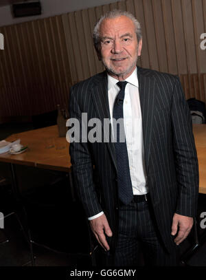 Lord Alan Sugar ....the many mainly despairing faces of the govts Enterprise Champion' at British Library event. Stock Photo