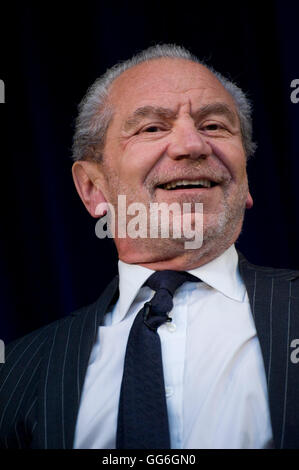 Lord Alan Sugar ....the many mainly despairing faces of the govts Enterprise Champion' at British Library event. Stock Photo