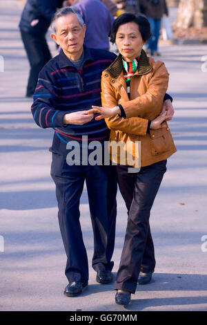 Mature Couple dancing in the Fuxing park, Shanghai, China Stock Photo