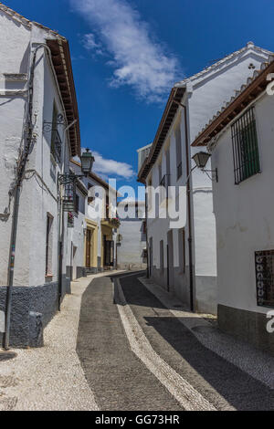 Narrow street in moorish Granada quarter Albaicin Stock Photo