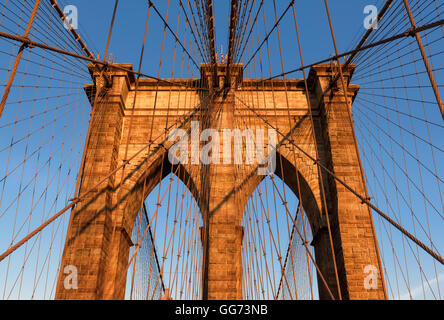 Brooklyn Bridge at sunset in New York City, USA Stock Photo